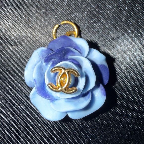 CHANEL Jewelry - CHANEL Blue and Gold Floral charm